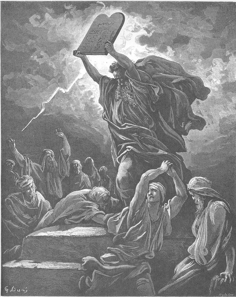 Moses handing down the 10 Commandments.